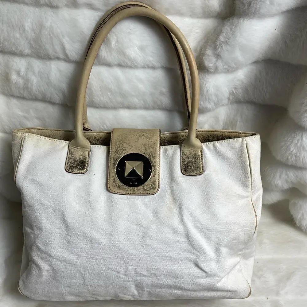 Vintage Kate spade beige canvas and faded gold trims shoulder bag.
